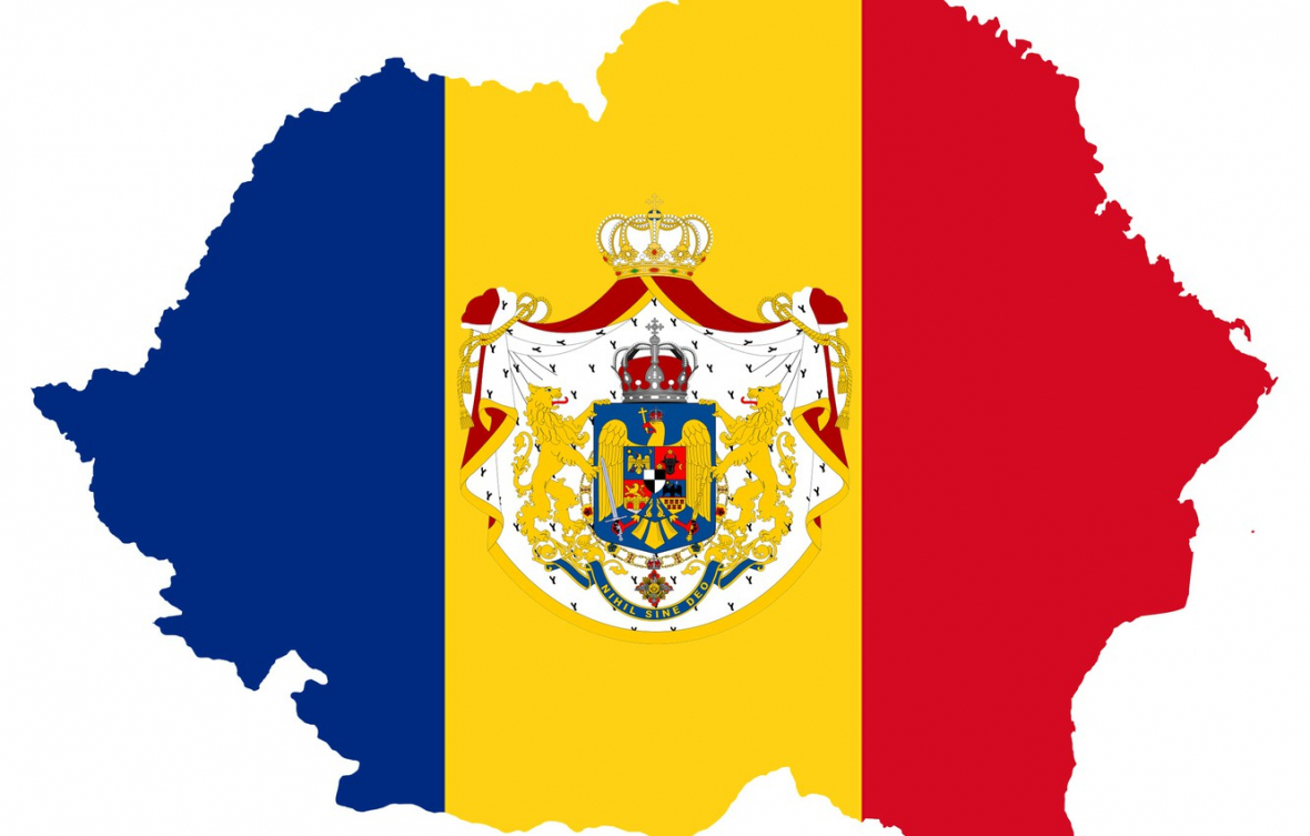 Флаг и герб Румынии, где иностранцы могут вести бизнес